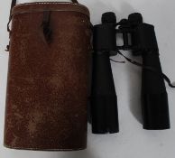 A  pair of Lieberman & Gortz military ? long binoculars  38 x 61 coated lenses having case
