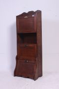 A late Victorian Arts & Crafts solid oak student bureau bookcase.