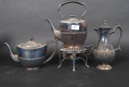 A collection of silver plated items to include a silver plated spirit burner,