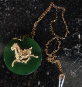 A 585 marked 14ct gold and jade pendant.