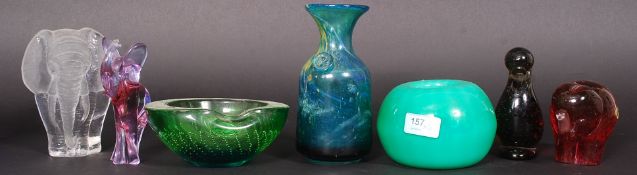 A collection of 7x pieces of glassware to include a Wedgwood elephant paperweight,