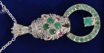 A white metal 925 silver, cz, emerald,