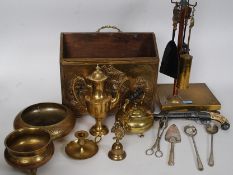 A collection of brasswares and metalwares to include ashtray / compendium on wooden base,