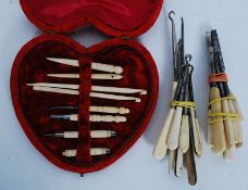 A 19th century Ivory handled ladies vanity set in later case comprising many tools.