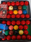 Two cased sets of snooker balls by Aramith, a Pro Cup set and the other being a Tournament set,