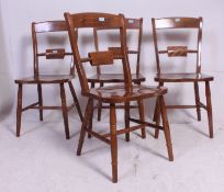 A set of 4 contemporary beech wood Oxford bar back kitchin dining chairs raised on turned legs with