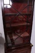 A Victorian mahogany thin library bookcase cabinet.