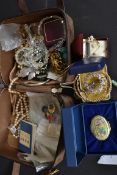 A collection of costume jewellery to include brooch, necklace,