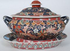 A Chinese - Asiatic heavy porcelain tureen and stand.