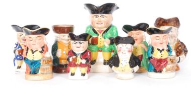 A collection of 9x toby / character jugs to include Royal Doulton and others.