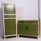 A vintage 1950's two tone low pedestal kitchen cabinet.