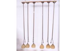 A set of large Art Deco style long arm ceiling lights from a Bristol venue having shaped glass