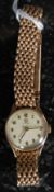A stunning 9ct gold ladies Omega dress watch complete with the original full 9ct gold bracelet