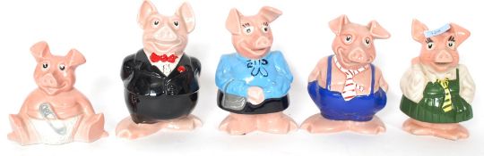 A set of 5 Nat West ceramic Pigs to include Mum, Dad,