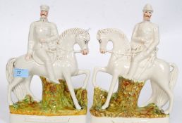A pair of Victorian Staffordshire flatback figurines - Sir Redvers Buller and Lord Roberts.