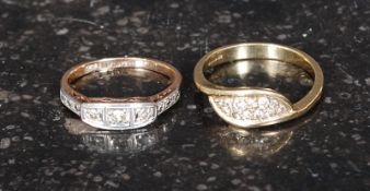 2 9ct gold ladies dress rings to  include a  swirl set ring and  another with 3 inset stones.