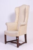 An excellent 18th century style mahogany wing back armchair.