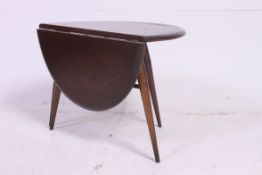 A Vintage Ercol elm and beech coffee table,