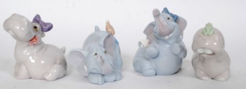 A collection of Nao figurines,