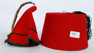 A mid century Fez in red felt with black a black tassle, size 8 made by Lamrani Freres Idriss FES,