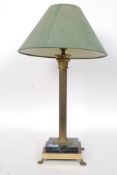A large Edwardian Corinthian column Brass table lamp on stepped square base