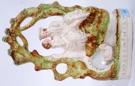 A Victorian Staffordshire flatback figurine of Robbie Burns & Mary.