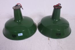 A pair of Revo 1940's Industrial enamel pendant shades.