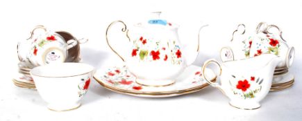 A pretty Colclough Carmina Poppy pattern tea service.