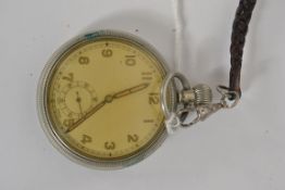 A military pocket watch with decorative face, swiss movement,