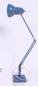 A 1940's rare blue Herbert Terry Industrial office anglepoise desk lamp raised on terraced square
