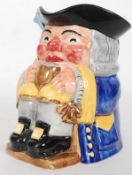 A Clarice Cliff  20th century designed Toby jug, with green stamped mark to base.