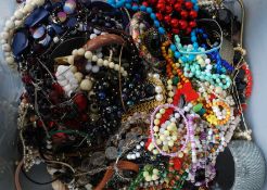 A large collection of vintage and contemporary costume jewellery to include bracelets, bangles,