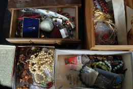 A large amount of assorted costume jewellery to include necklaces, bracelets, rings, cufflinks,