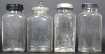 A group of four vintage / retro glass sweet jars to include Trebor etc.