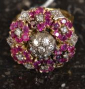 A ladies large gold ( tests 14-18ct ) diamond ring having swirl mount on plain shank.