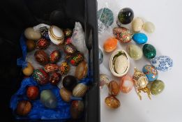 A box of collectable ceramic eggs to include gilt decorated, hand painted,