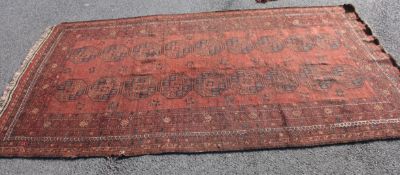 A good antique hand woven tribal carpet having  medallions and geometric design - likely Persian
