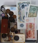 A collection of coins, foreign banknotes, a sterling maple leaf brooch,