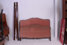 A 1930's French Louis XV style corbeille double bed having show wood head and footboard united by