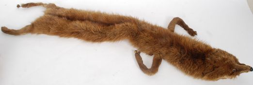 A vintage 1940's ladies fur stole with lined verso, claws,