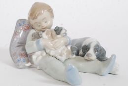 A Lladro porcelain figure group entitled ' Sweet Dreams ' Impressed factory marks 1535 to base also