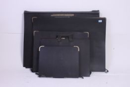 A 1960's / 1970's retro G-Plan style teak wood sideboard raised on tapered supports having a series