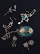 A collection of ladies silver jewellery to include enamel pendant and chain, earrings,