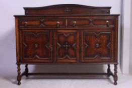 A 1920''s large Barleytwist oak Jacobean revival sideboard.