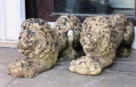 A good pair of 20th century reconstituted stone garden lions,
