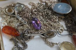 A collection of silver jewellery to include amber  earrings and necklace set,