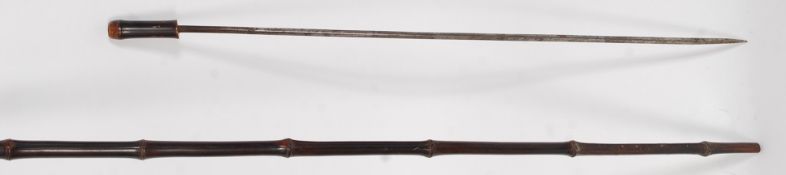 An antique Sword stick in bamboo a cane,