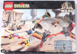 LEGO STAR WARS; Original Lego Star Wars set 7171 Mos Espa Podrace, within the original box.