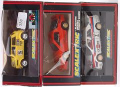 SCALEXTRIC; A collection of 3x boxed Scalextric slot racing cars - C572 Alfa Romeo 155,