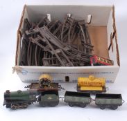 HORNBY; An original vintage Hornby 0 Gauge 60985 tinplate clockwork locomotive and tender,